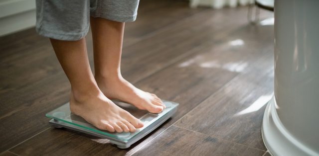 Stepping onto a body composition scanner