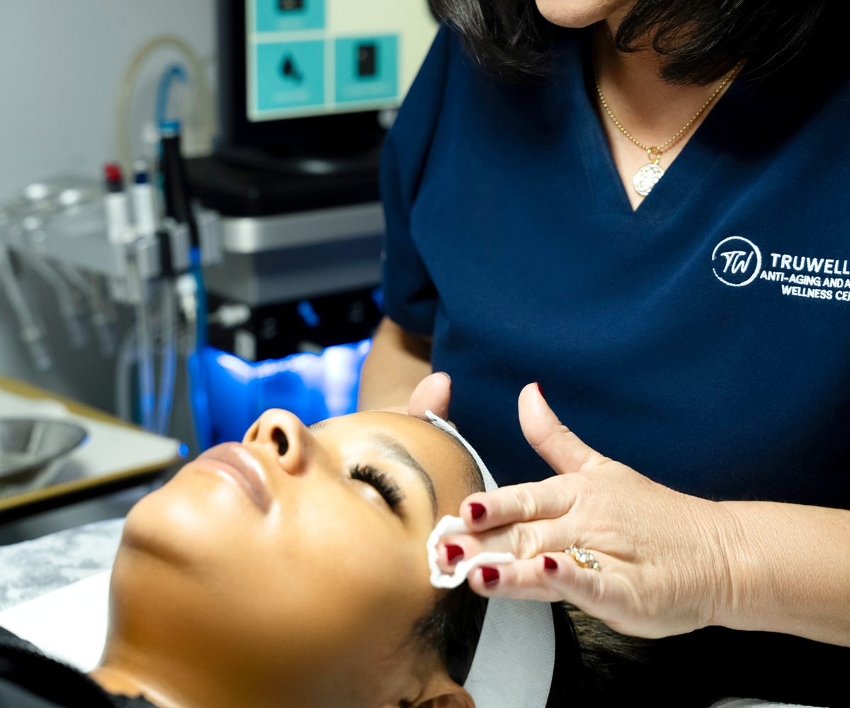 Client receiving a Hydrafacial® treatment at TruWellness in Newburyport